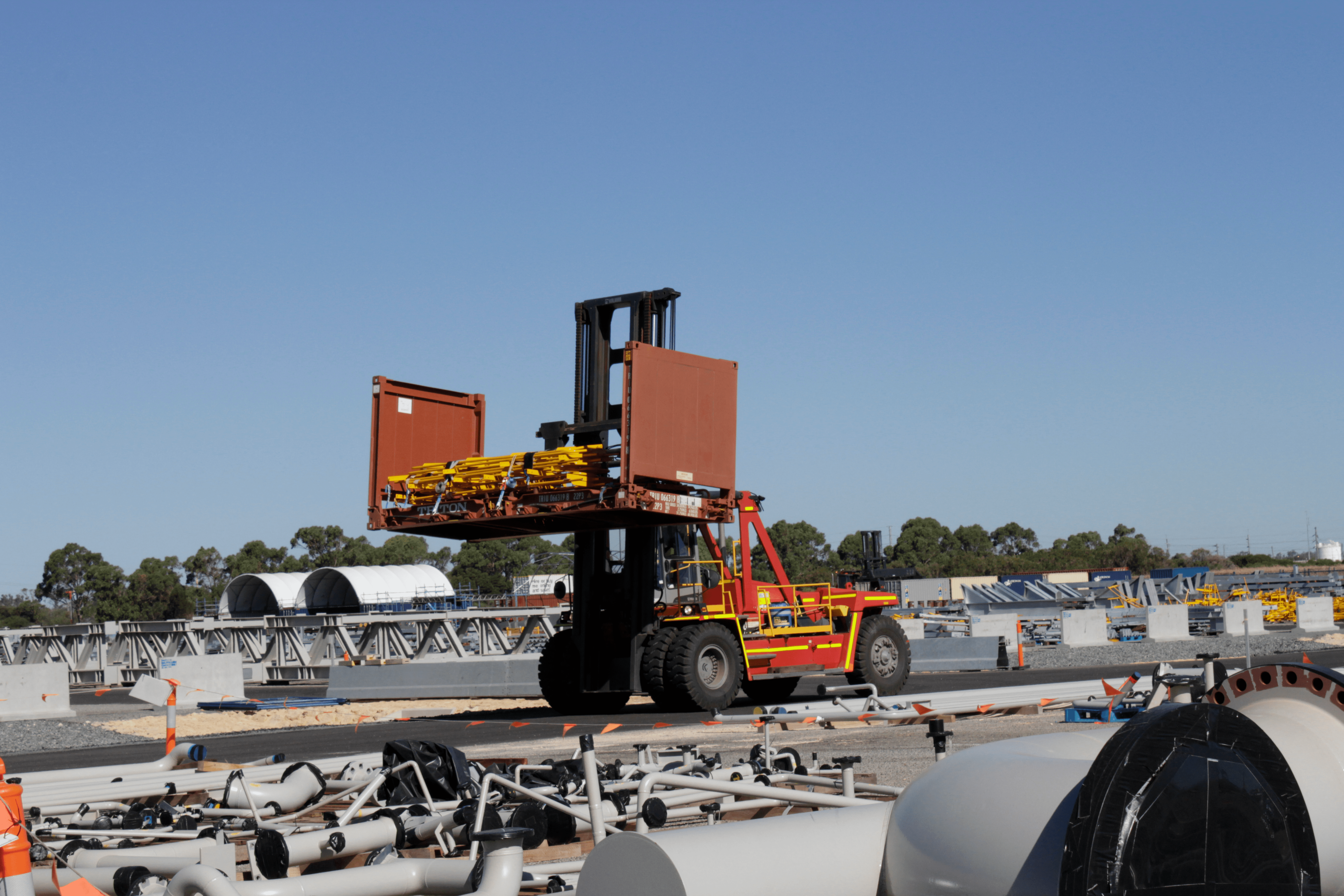 a forklift truck with a container on the back